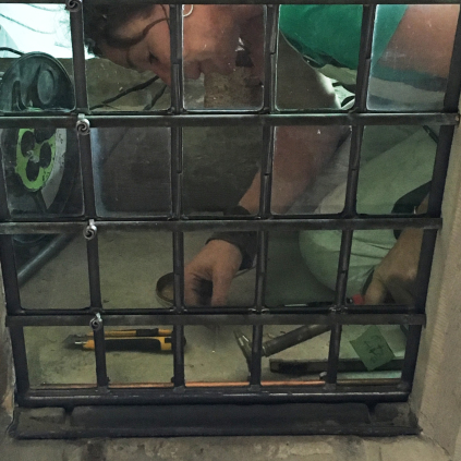 Grote Sint Laurenskerk onderhoud glas-in-lood